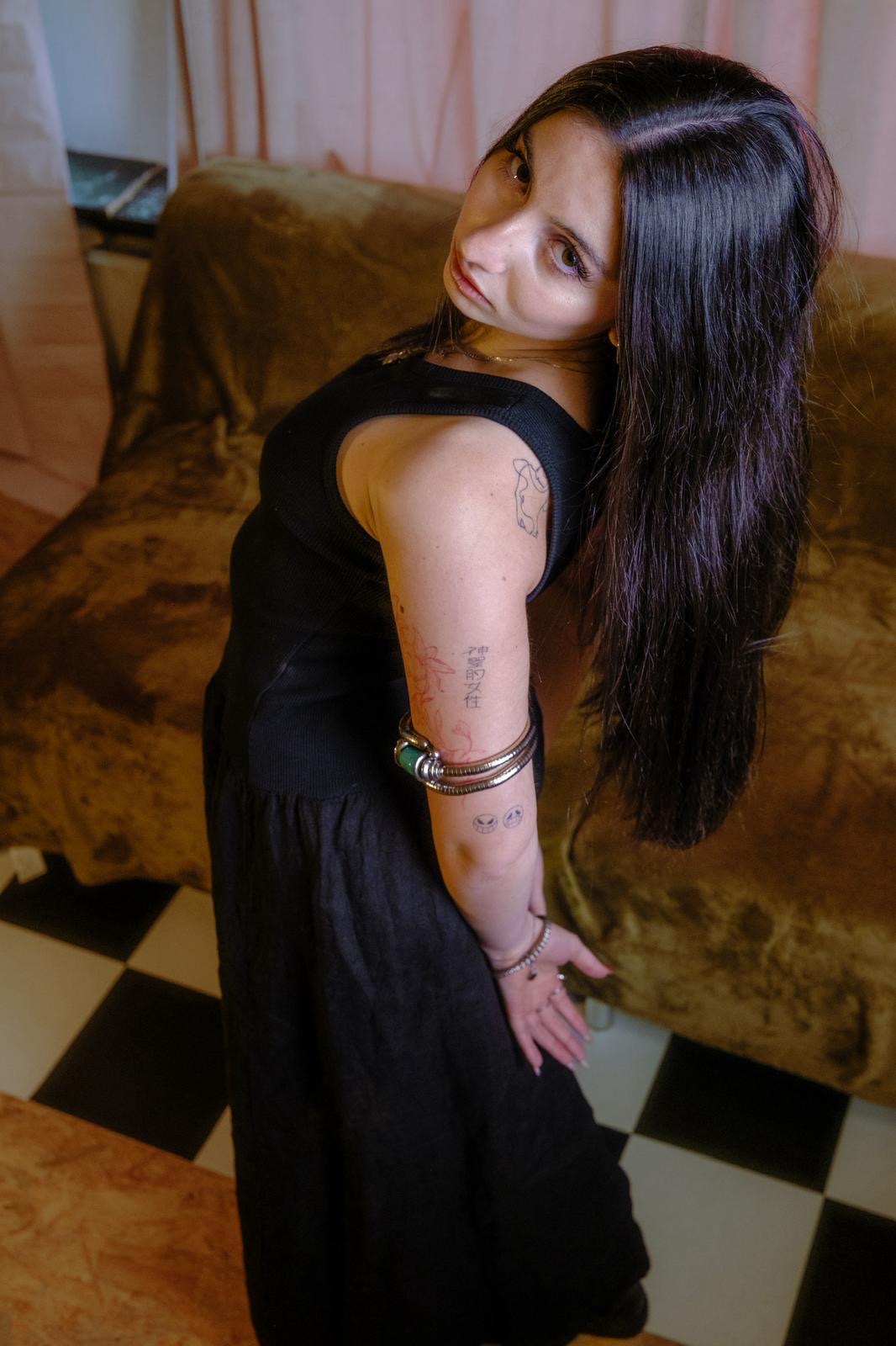 Black tank dress, long hair