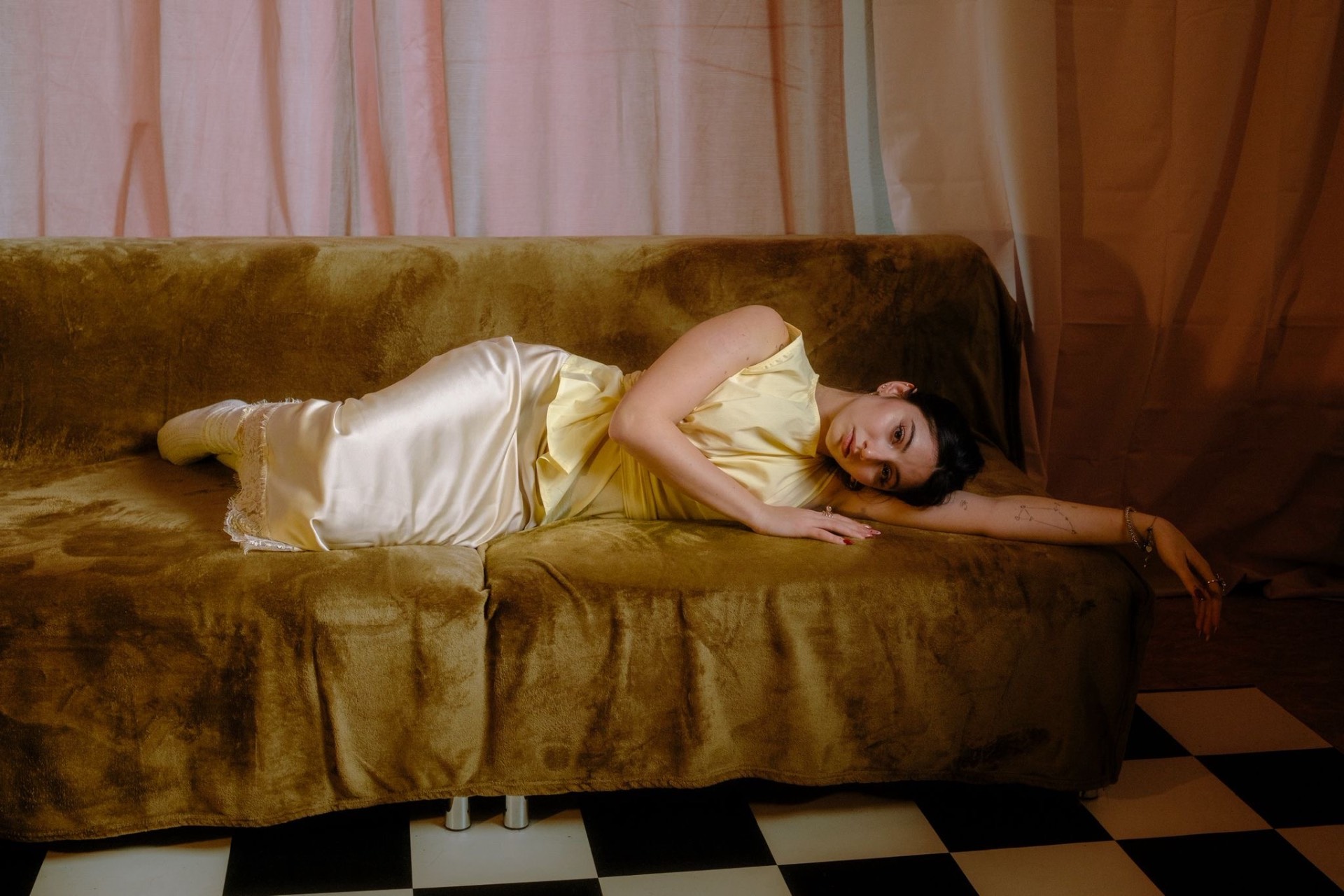 Cream silk dress reclining